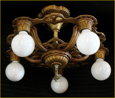 Title: Five light ceiling fixture, 1920s - Description: Intricately cast five light bulb style chandelier typical of the 1920s. Antique Lighting