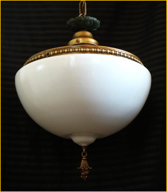 Title: 1920 Vancouver Island Light Fixture - Description: Large milk glass tasseled shade on this antique brass pendant with green accents, marked 1920. 