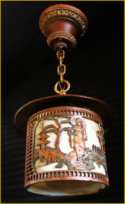 Title: Antique Porch Light - Description: Oriental lady theme cast metal porch light with curved caramel glass early 1900s